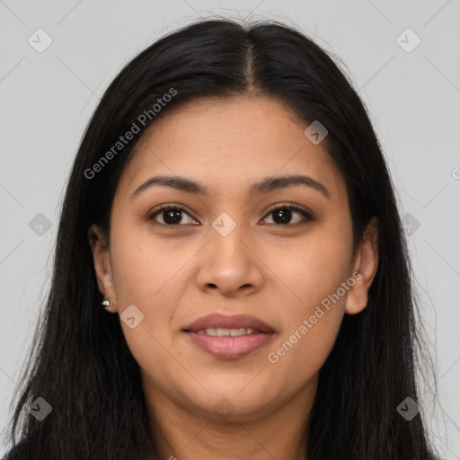 Joyful latino young-adult female with long  brown hair and brown eyes