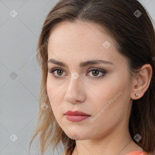 Neutral white young-adult female with medium  brown hair and brown eyes