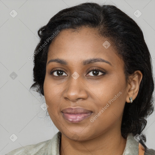 Joyful black young-adult female with medium  black hair and brown eyes