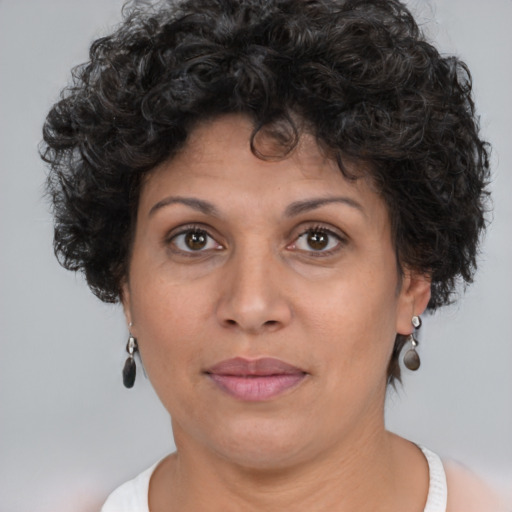 Joyful white adult female with short  brown hair and brown eyes
