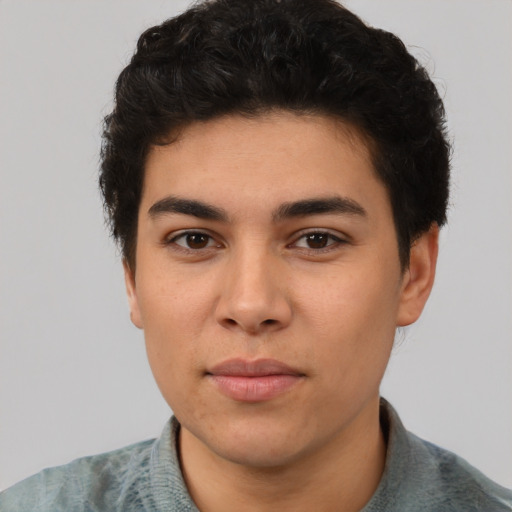 Neutral white young-adult male with short  black hair and brown eyes