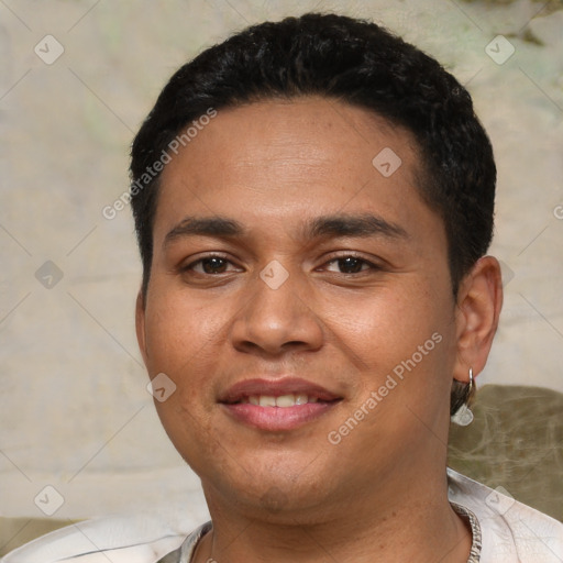 Joyful latino young-adult male with short  black hair and brown eyes