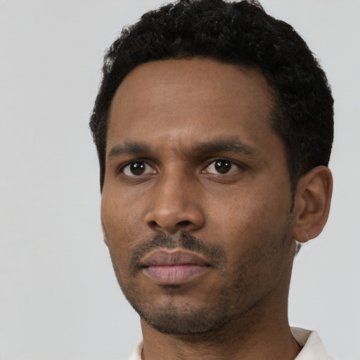 Neutral black young-adult male with short  black hair and brown eyes