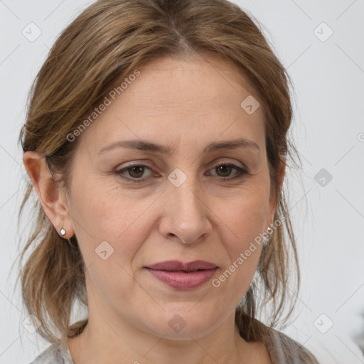 Joyful white adult female with medium  brown hair and grey eyes