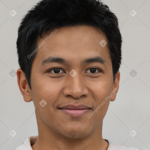 Joyful asian young-adult male with short  black hair and brown eyes