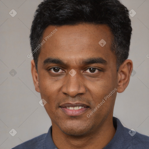 Joyful latino adult male with short  black hair and brown eyes