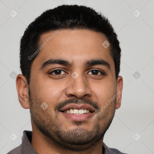 Joyful latino young-adult male with short  black hair and brown eyes