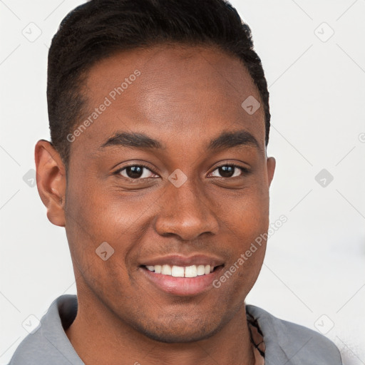 Joyful black young-adult male with short  brown hair and brown eyes