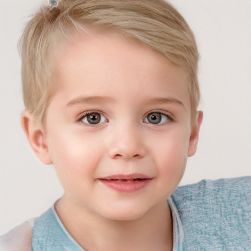 Joyful white child female with short  blond hair and blue eyes