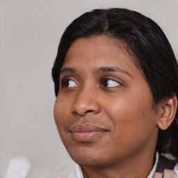 Joyful asian young-adult female with medium  black hair and brown eyes