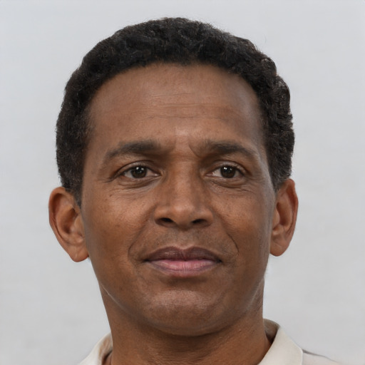 Neutral black adult male with short  brown hair and brown eyes