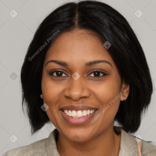 Joyful black young-adult female with medium  brown hair and brown eyes