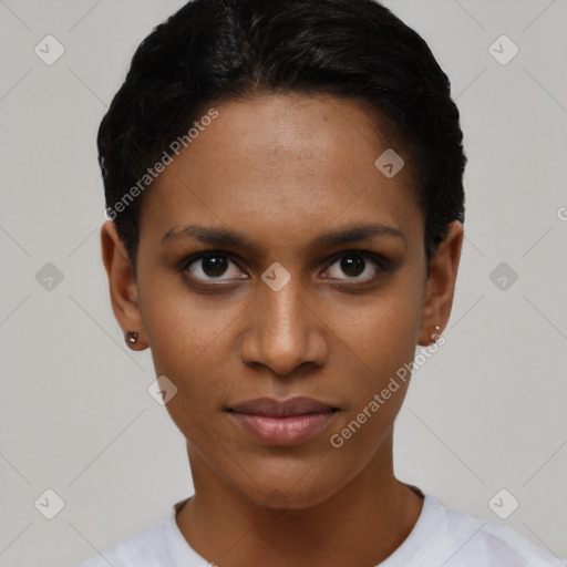 Joyful black young-adult female with short  brown hair and brown eyes