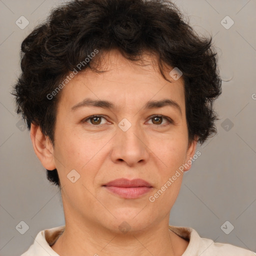 Joyful white adult female with short  brown hair and brown eyes