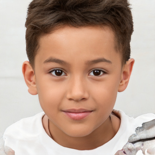 Joyful white child male with short  brown hair and brown eyes