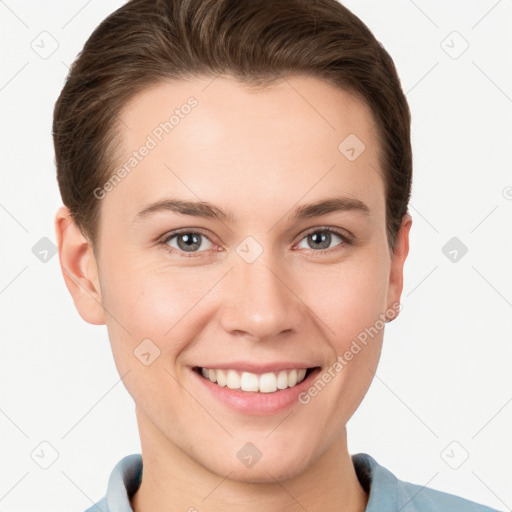 Joyful white young-adult female with short  brown hair and grey eyes