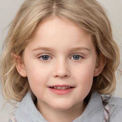 Joyful white child female with medium  brown hair and grey eyes