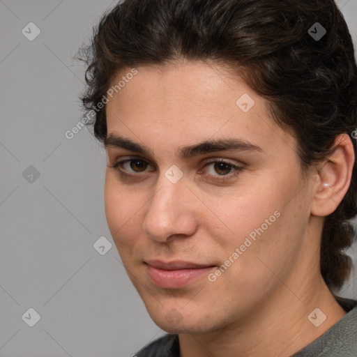 Joyful white young-adult male with medium  brown hair and brown eyes