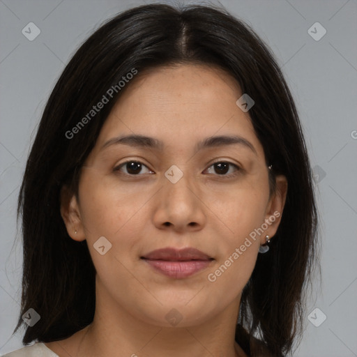 Joyful latino young-adult female with medium  brown hair and brown eyes