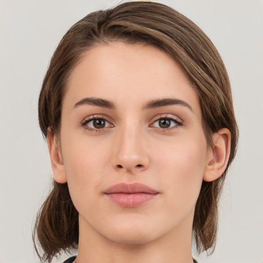 Neutral white young-adult female with medium  brown hair and brown eyes