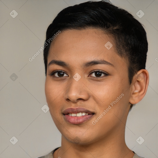 Joyful latino young-adult female with short  black hair and brown eyes