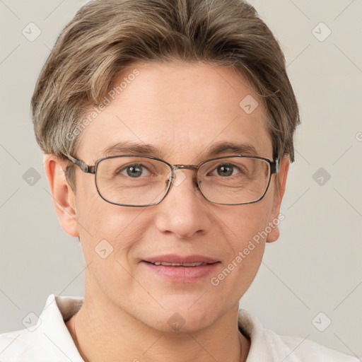 Joyful white adult female with short  brown hair and grey eyes