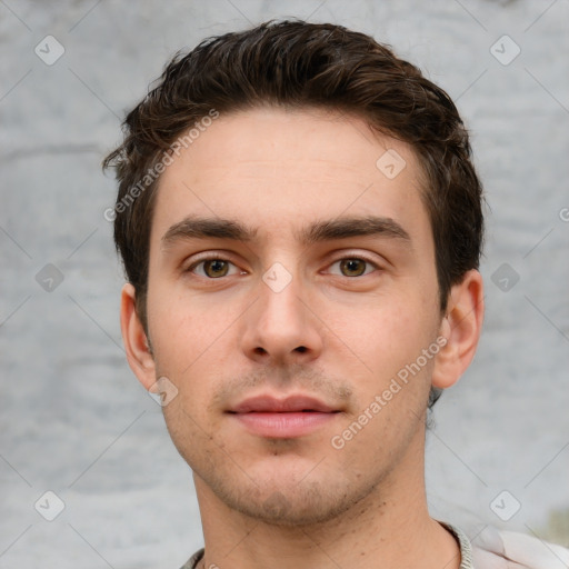 Neutral white young-adult male with short  brown hair and grey eyes