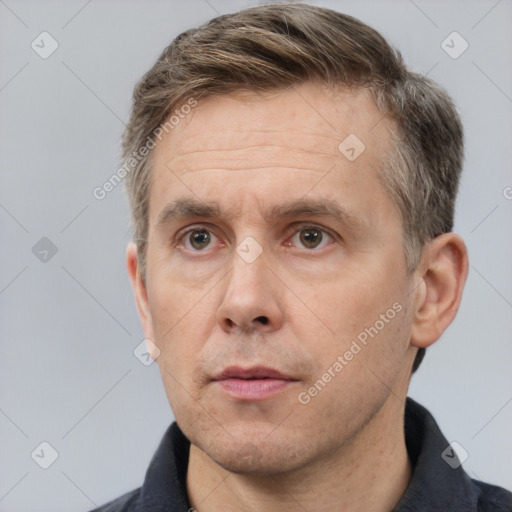 Neutral white adult male with short  brown hair and brown eyes