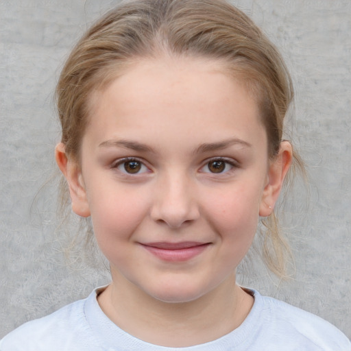 Joyful white child female with medium  brown hair and brown eyes