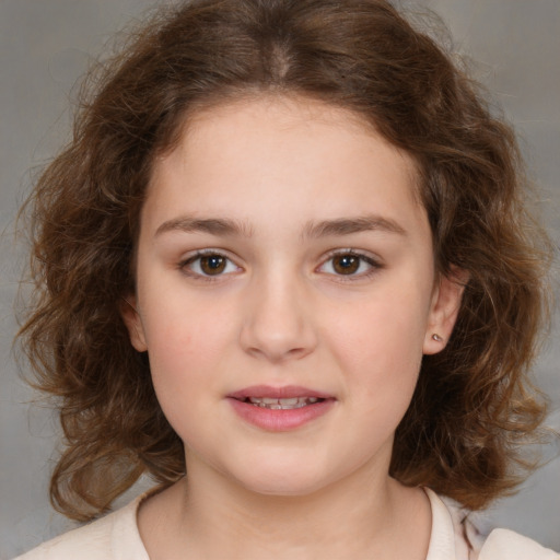 Joyful white child female with medium  brown hair and brown eyes