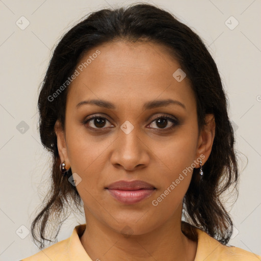 Joyful black young-adult female with medium  brown hair and brown eyes