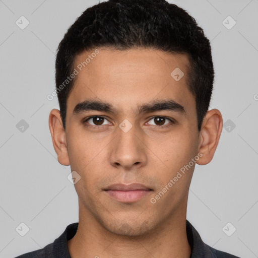 Neutral white young-adult male with short  black hair and brown eyes
