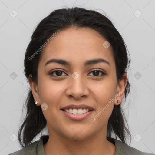 Joyful latino young-adult female with medium  brown hair and brown eyes