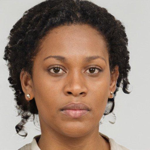Neutral black young-adult female with short  brown hair and brown eyes