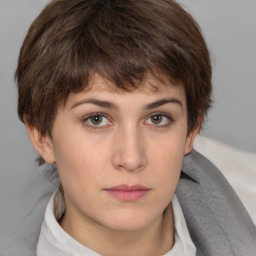 Neutral white young-adult female with short  brown hair and brown eyes