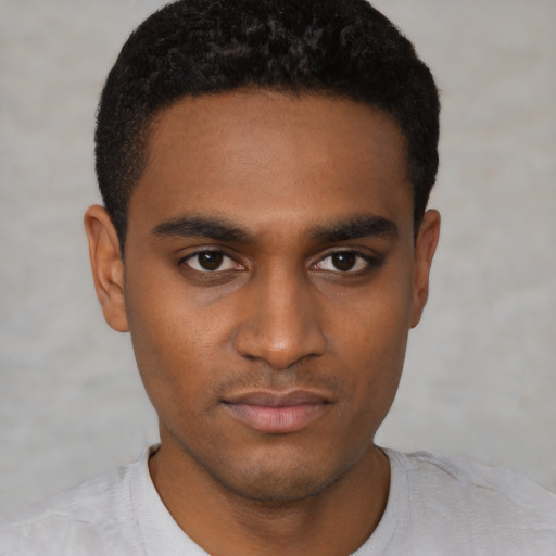 Neutral black young-adult male with short  black hair and brown eyes