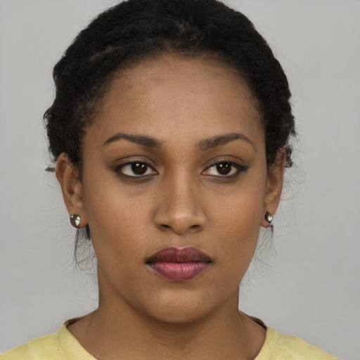 Neutral latino young-adult female with short  black hair and brown eyes