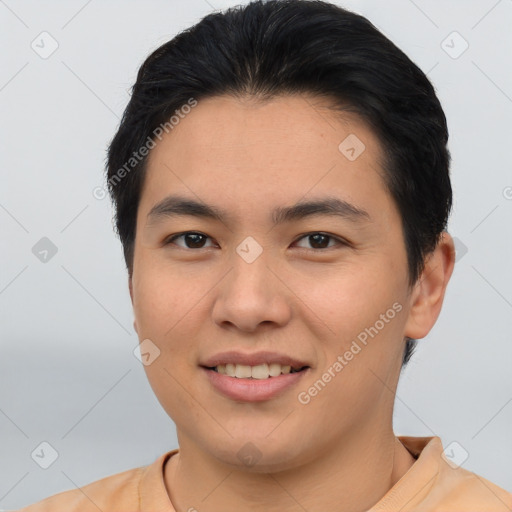 Joyful asian young-adult male with short  brown hair and brown eyes