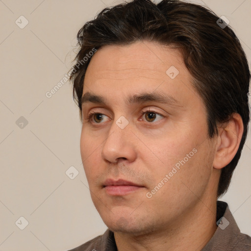 Neutral white adult male with short  brown hair and brown eyes