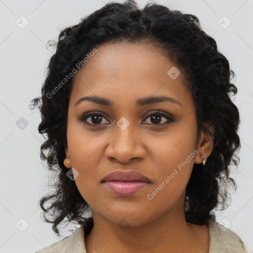 Joyful black young-adult female with long  brown hair and brown eyes