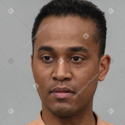 Neutral latino young-adult male with short  black hair and brown eyes