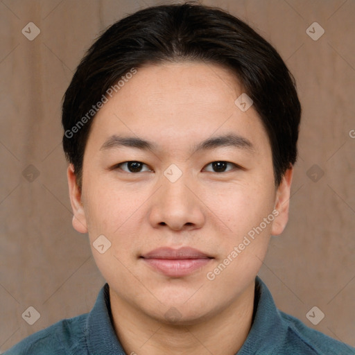 Joyful asian young-adult male with short  brown hair and brown eyes