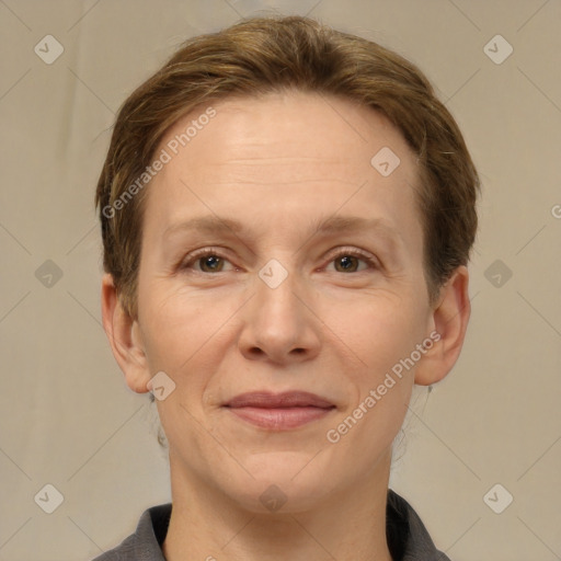 Joyful white adult female with short  brown hair and brown eyes