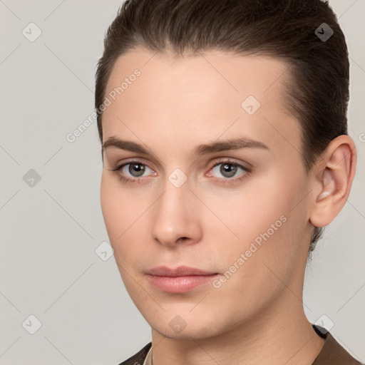 Neutral white young-adult female with short  brown hair and brown eyes