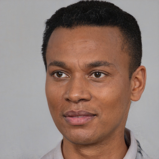 Neutral black young-adult male with short  black hair and brown eyes