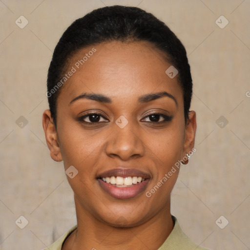 Joyful black young-adult female with short  black hair and brown eyes