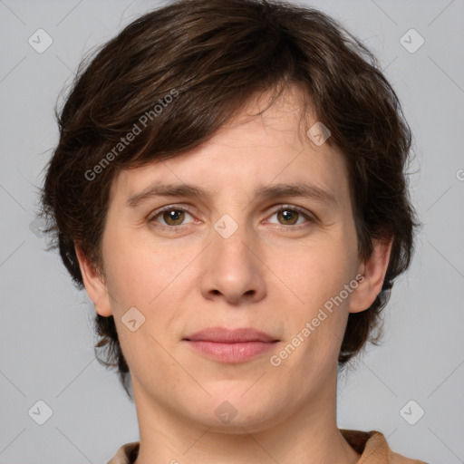 Joyful white young-adult female with medium  brown hair and green eyes