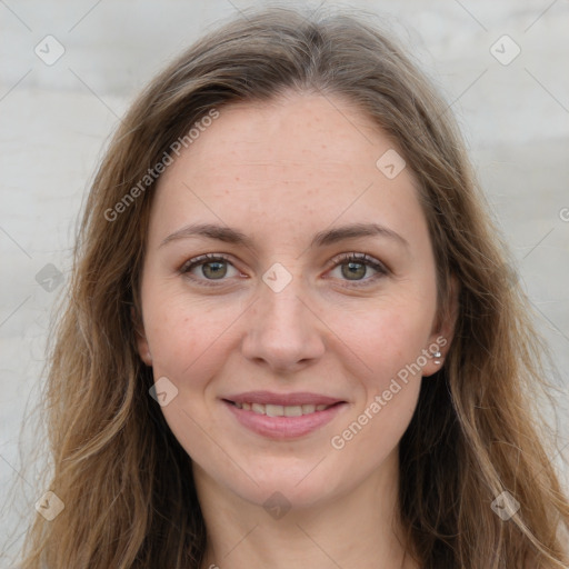 Joyful white young-adult female with long  brown hair and grey eyes