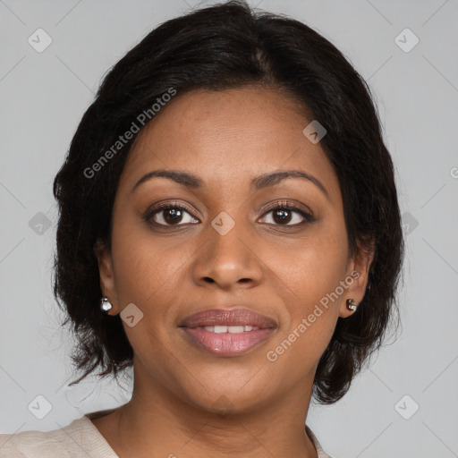 Joyful black young-adult female with medium  brown hair and brown eyes