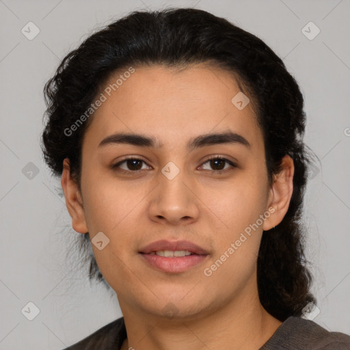 Joyful latino young-adult female with short  black hair and brown eyes